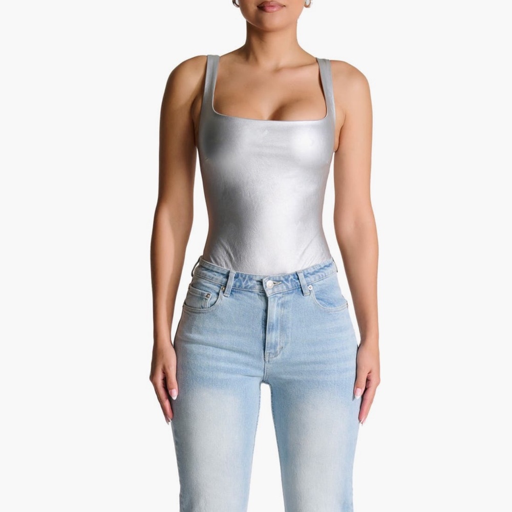 Silver bodysuit by naked wardrobe